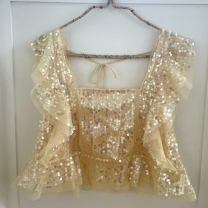 Festive holiday sequin top from Anthropologie